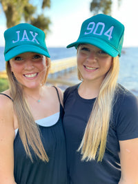 JAX Trucker Hat is the perfect blend of sporty chic and laid-back flair