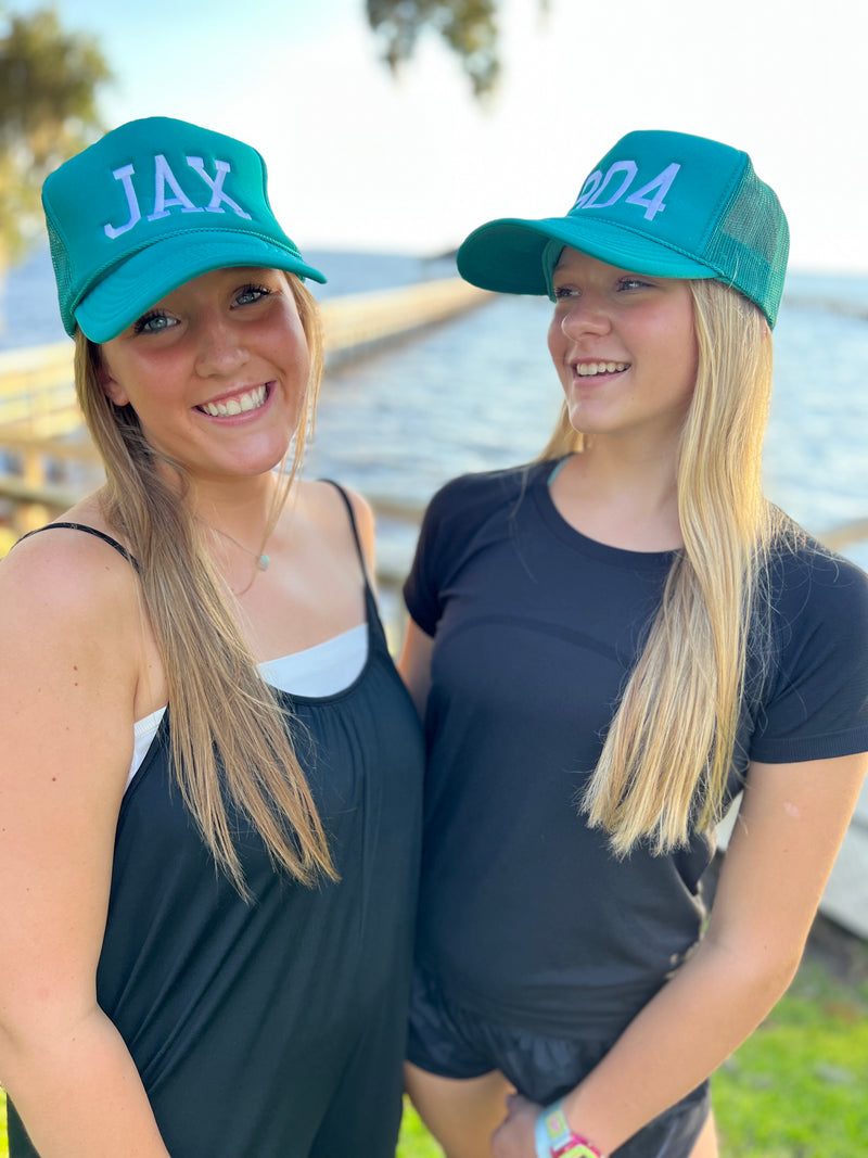 JAX Trucker Hat is the perfect blend of sporty chic and laid-back flair