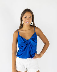 Woven satin top V-neckline with twist-front detail Adjustable cami straps