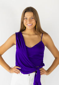 Asymmetric side tie top Woven satin  Surplice neckline Sleeveless Deep Purple The perfect top to dress-up with a skirt or slacks or wear it with shorts or jeans for a more casual look.